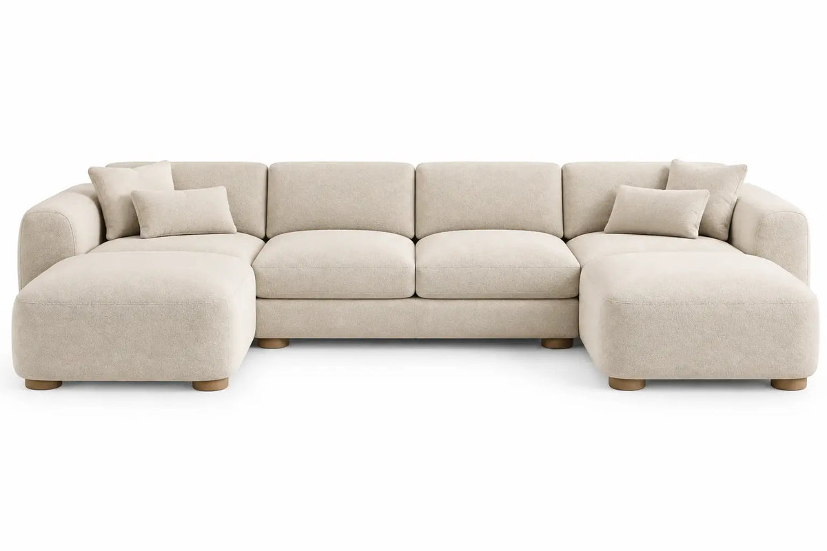 Beige U-shaped upholstered sofa with rounded contour design, stylish furniture piece from Heatproofbenchhaven.